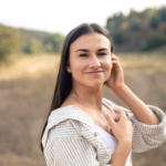summer-portrait-happy-young-woman-field_169016-44879